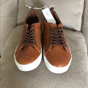 Brand new with tags size 4 boys brown shoes.
